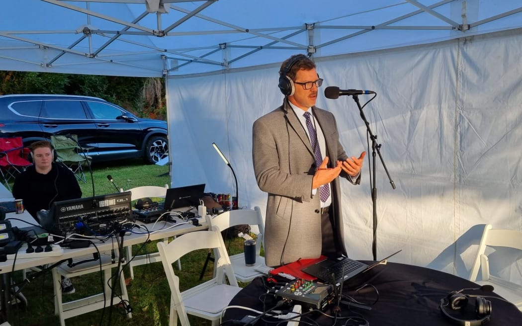 Corin Dann broadcasting live for Morning Report from the Waitangi Treaty Grounds 5 February 2024.