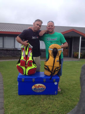 From left, Jason Yorke and Lyndon Enright clung to a chilly bin to support them as they swam to safety after their dinghy sank the Bay of Plenty.