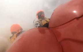 Skipper of Under Siege Ross Christensen and ski observer Adam being thrown out of the jet boat.