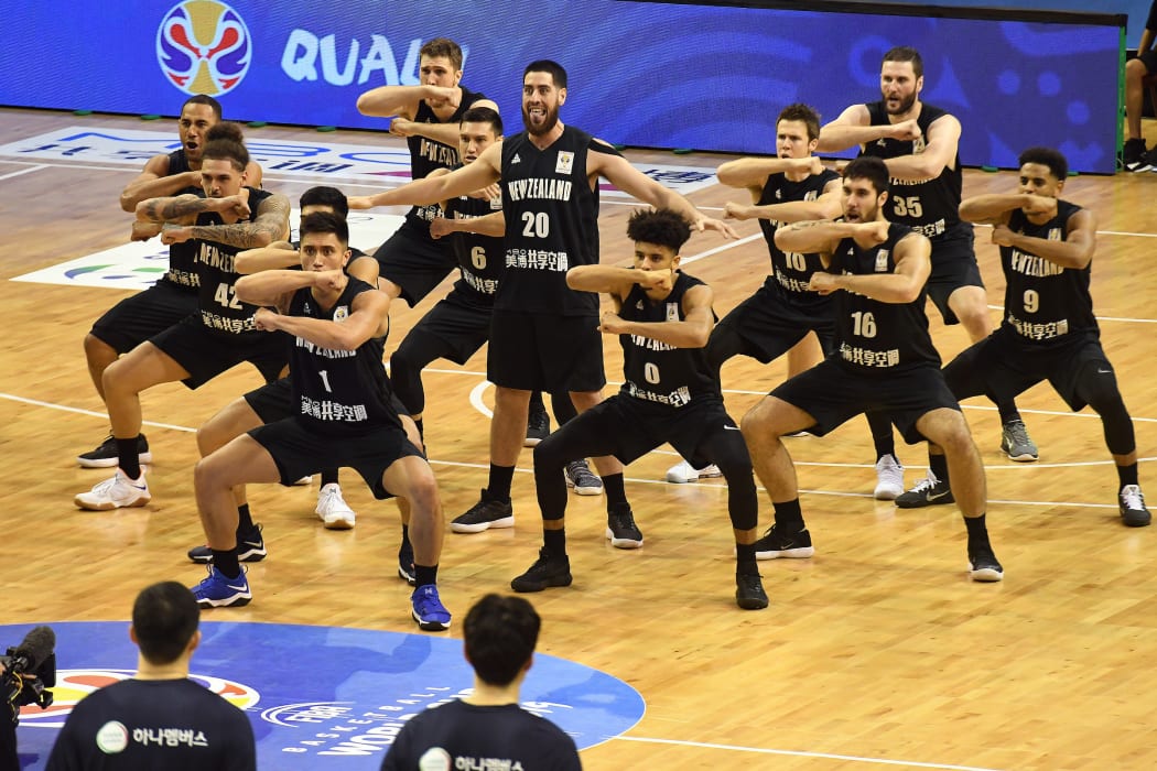 Tall Blacks perform the haka before the start of play.