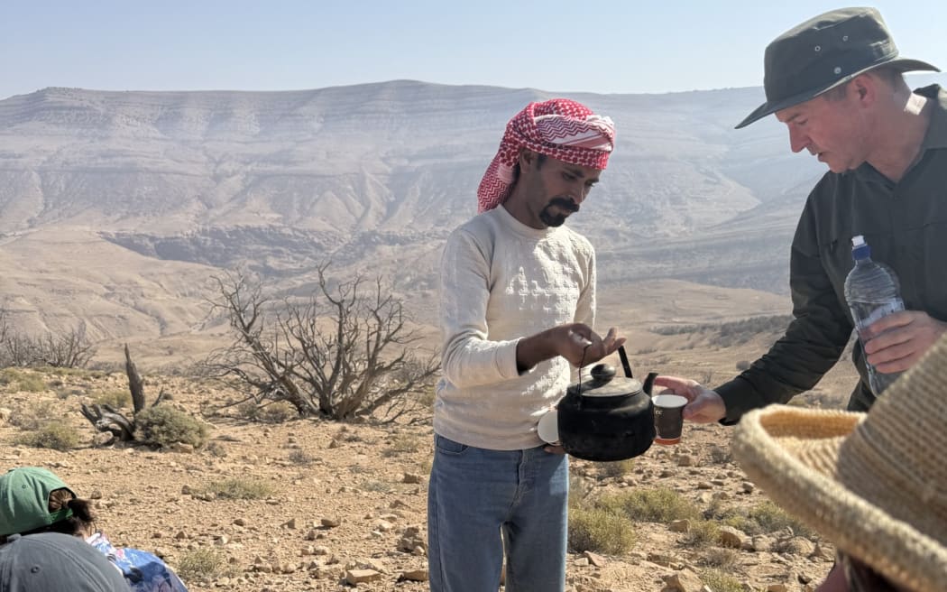 Bedouin tour guide Hamad Hamad al Manajih serving tea.