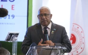 Fijian Prime Minister Frank Bainimarama makes a speech during a panel organised by UN-Habitat, within the United Nations Climate Change Conference.