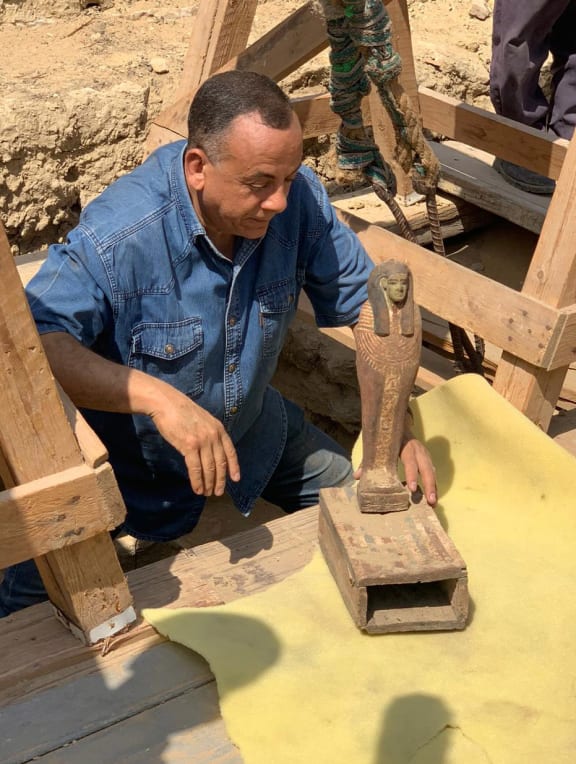 A sculpture found at the site where the coffins were discovered.