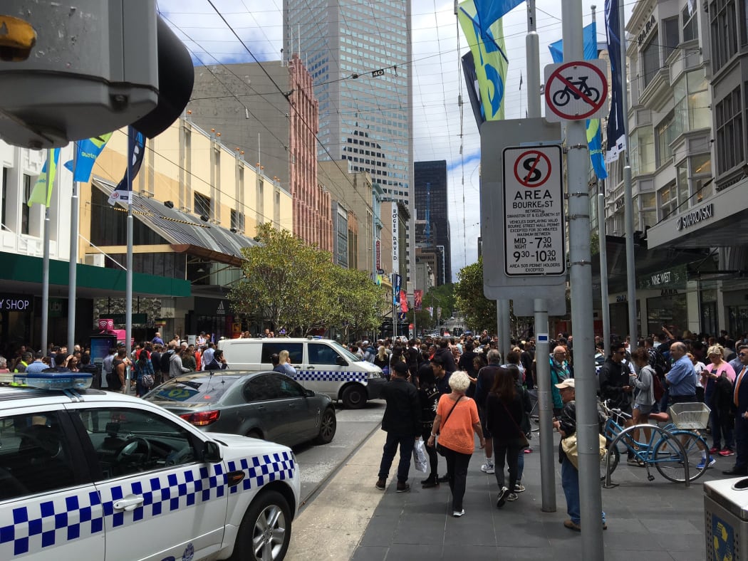 A car has hit pedestrians in the centre of Melbourne, killing at least one person, Australian emergency services say.