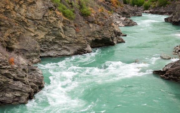 Two men got caught in rapids on the Kawarau River on an inflatable matress.