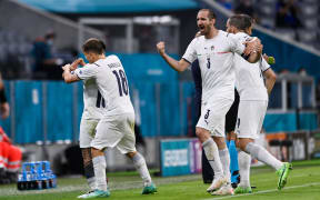Italy celebrate after scoring their second goal against Belgium in their Euro 2020 quarterfinal in Munich on July 2, 2021.