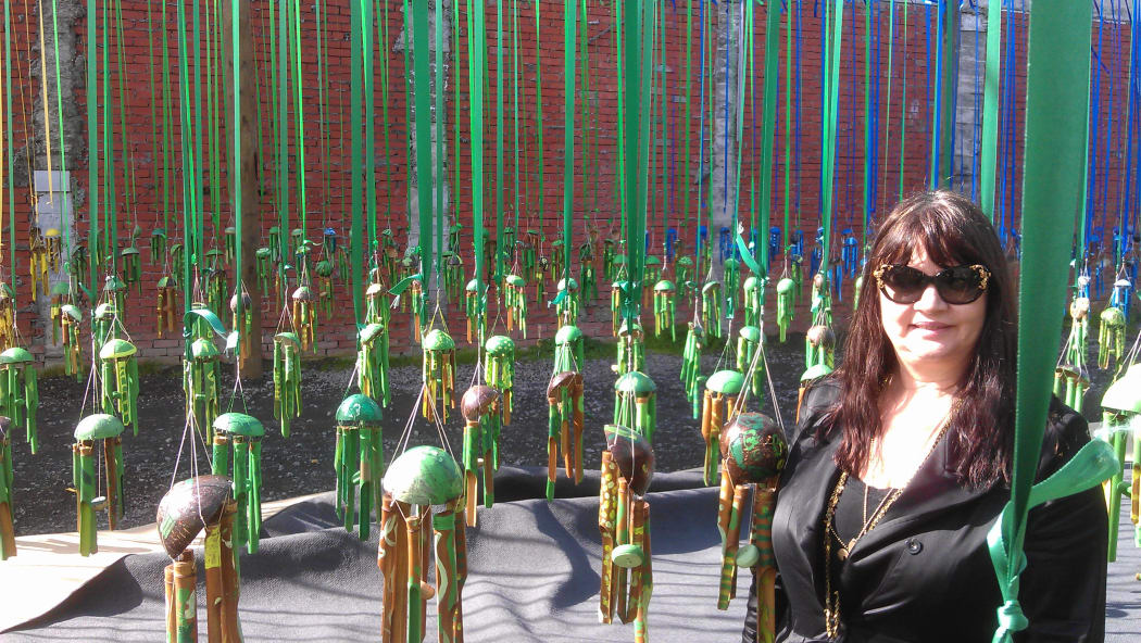Suzanne Porter by artist Tiffany Singh's community art installation in New Plymouth.
