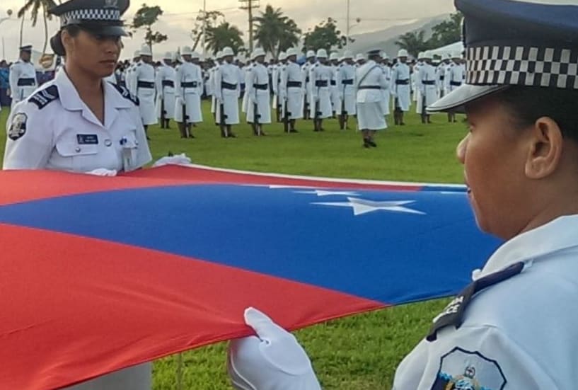 Members of the Samoan Police Force preparing to raise the national flag at Independence Day celebrations in Apia.