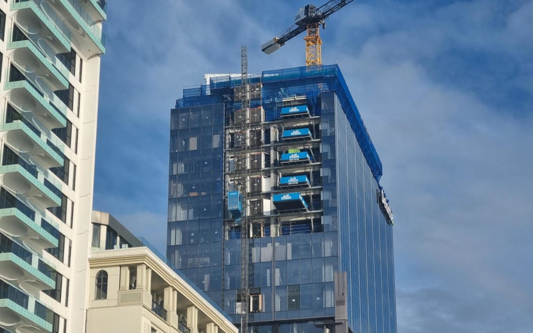 The building at the centre of the serious incident in Auckland CBD on 20 July 2023 is currently a construction zone. It was believed more than 100 workers were inside at the time.