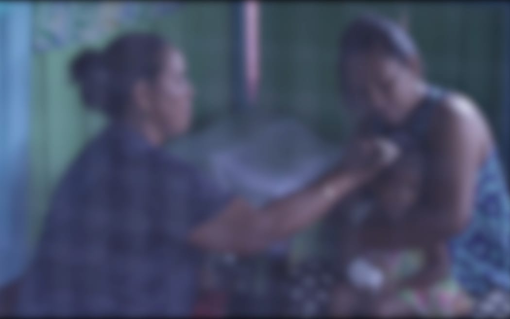 Samoan traditional healer Maria Amituanai treats patients with measles symptoms.