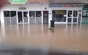 Flooded shops in Kumeū today.
