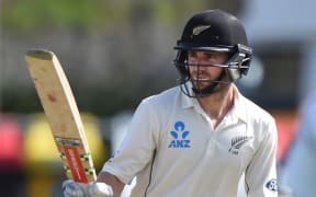 Kane Williamson raises his bat to salute the crowd after reaching his 50 not out vs Sri Lanka at Seddon Park. Sunday 20 December 2015. Copyright photo: Andrew Cornaga / www.photosport.nz