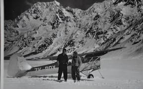 Sir Edmund Hillary (left) was one of the earliest passengers aboard Sir Harry Wigley’s first glacier flights on 22 September, 1955.