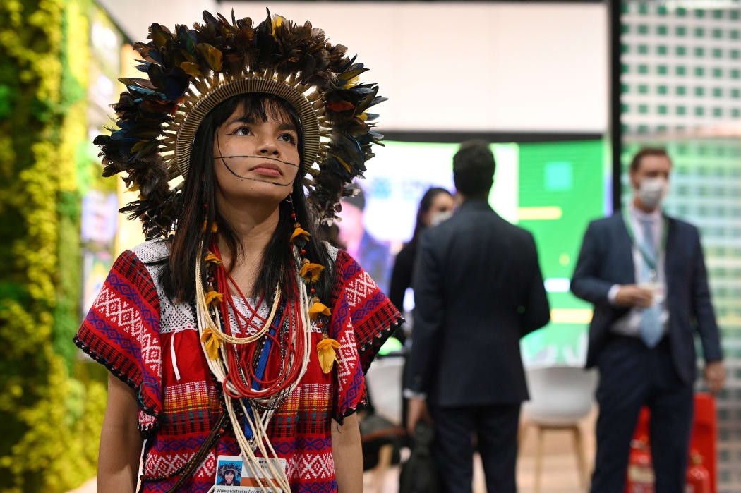 Walelasoetxeige Paiter Bandeira Surui, an indigenous activist from the Paiter Surui people of the state of Rondonia, Brazil poses for a photograph on the sidelines of the COP26 UN Climate Change Conference.