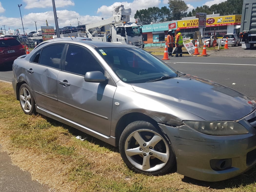The car which crashed through a petrol station appears to have been abandoned nearby.