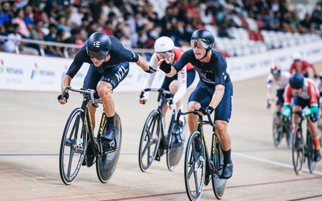 Campbell Stewart (left) and Aaron Gate competition in the two rider madison.