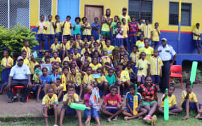 Social Impact and Inclusion Program  Ambassadors and Vanuatu Police with students from Ecole Publique de Centre Ville.