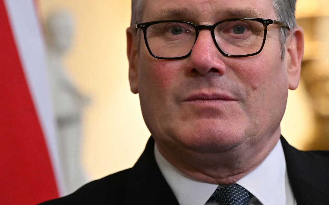 Britain's Prime Minister Keir Starmer talks with Germany's President Frank-Walter Steinmeier (unseen) during a meeting inside 10 Downing Street in central London on December 3, 2025, the first day of a three-day state visit by the German president. (Photo by JUSTIN TALLIS / POOL / AFP)