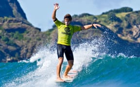 Zane Schweitzer rides the longboard