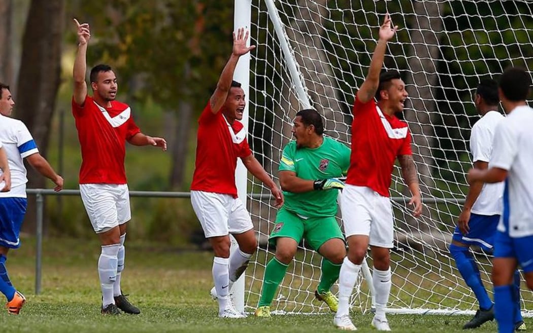 Samoa celebrates a goal.