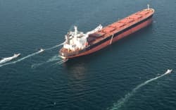 This handout photo released by Iran’s Revolutionary Guards Corps (IRGC)’s official website Sepanews on February 17, 2026, shows boats manoeuvering around a tanker vessel during a military exercise by members of the IRGC and navy in the Strait of Hormuz. (Photo by SEPAH NEWS / AFP) / == RESTRICTED TO EDITORIAL USE - MANDATORY CREDIT “AFP PHOTO / HO / SEPAHNEWS” - NO MARKETING NO ADVERTISING CAMPAIGNS - DISTRIBUTED AS A SERVICE TO CLIENTS Boats maneuver around a tanker vessel during a military exercise by members of the IRGC and the navy in the Strait of Hormuz.==