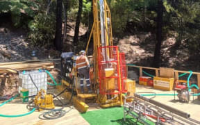 A diamond drilling rig at Sams Creek in the Upper Takaka Valley.