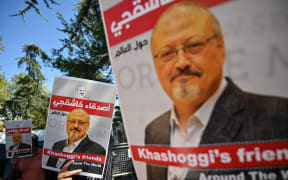 Posters of murdered Saudi journalist Jamal Khashoggi at an event marking the anniversary of his assassination  in front of Saudi Arabia consulate, Istanbul, 2 October 2020.