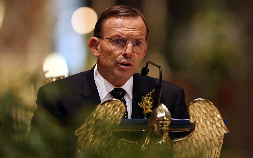 Australia's Prime Minister Tony Abbott speaks at a national day of mourning service for the victims of Malaysia Airlines flight MH17 at St. Patrick’s Cathedral in Melbourne.
