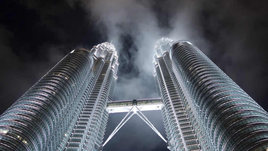 The Petronas Twin Towers are seen at night in Kuala Lumpur November 20, 2015. The Malaysian city hosts the 27th Association of South East Asian Nations (ASEAN) Summit