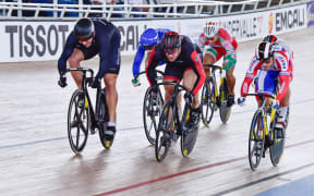 Eddie Dawkins (L) in action in the men's keirin in Colombia