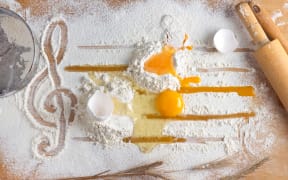 Concept of cooking a dough as notes in music