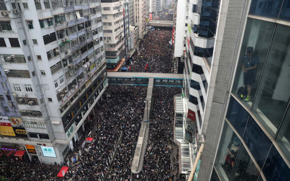 Thousands of protesters dressed in black take part in a new rally against a controversial extradition law proposal in Hong Kong on June 16, 2019.