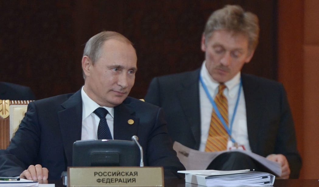 Russian President Vladimir Putin and press secretary Dmitry Peskov attend an expanded format meeting of the Supreme Eurasian Economic Council. Aleksey Nikolskyi/RIA Novosti