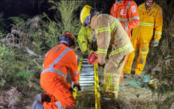 Emergency services work together to bring Bruce Miller back to the surface. (Supplied: Country Fire Authority)