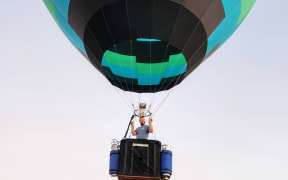 Hot air balloon pilot and maker Michael Toulson in one of his creations.