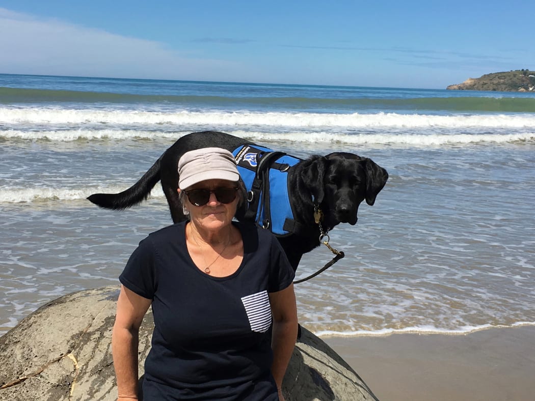 Ann Dredge with support dog, Lexus