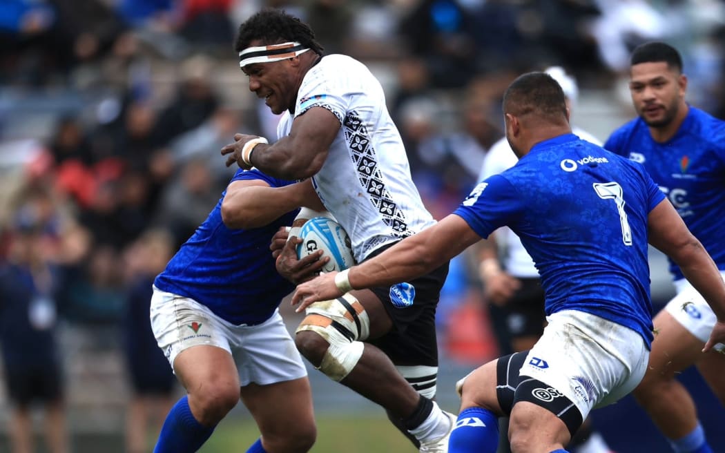 Flying Fijians number eight Elia Canakaivata on the run for Fiji as he takes on the Samoans at the Rotorua International Stadium in this Pacific Nations Cup match on Saturday. Fiji won 29-15.