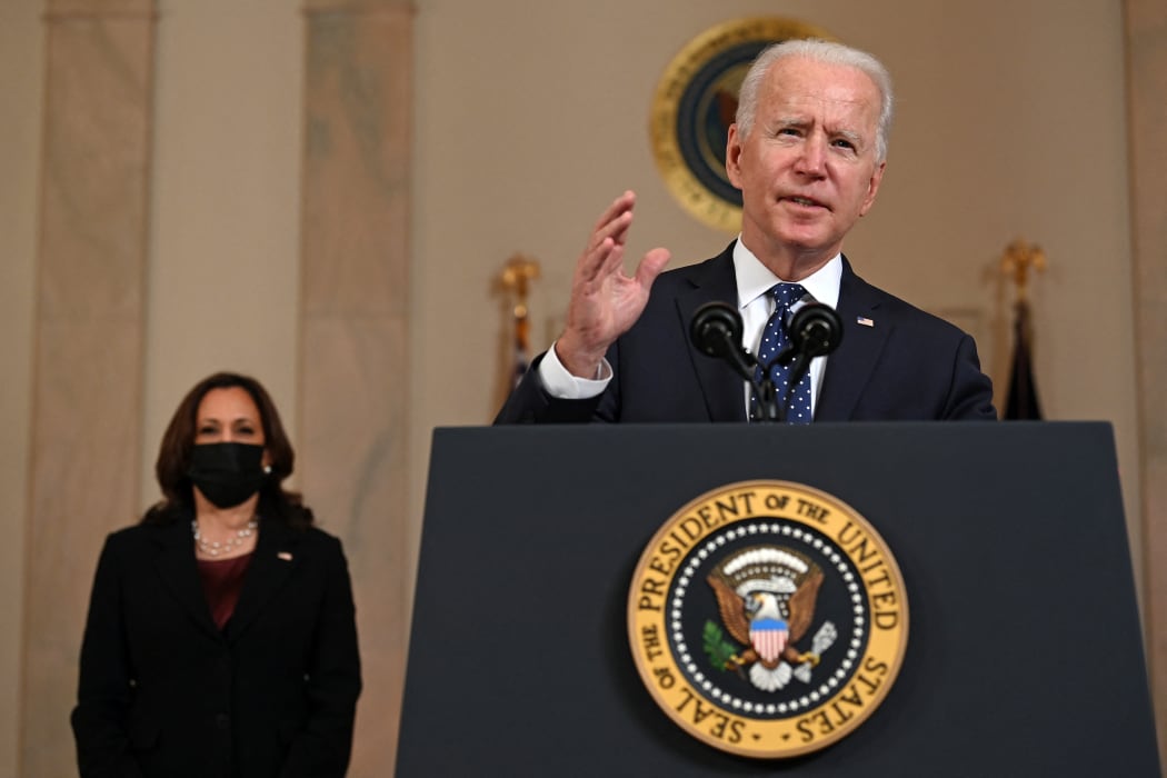 Vice President Kamala Harris listens as US President Joe Biden delivers remarks on the guilty verdict against former policeman Derek Chauvin at the White House in Washington, DC, 20 
April 2021.