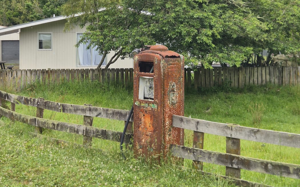 A mailbox made from an old fuel pump.