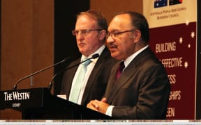 Papua New Guinea Prime Minister Peter O’Neill (right) with Ian Clarke, Past President, Australia PNG Business Council.
