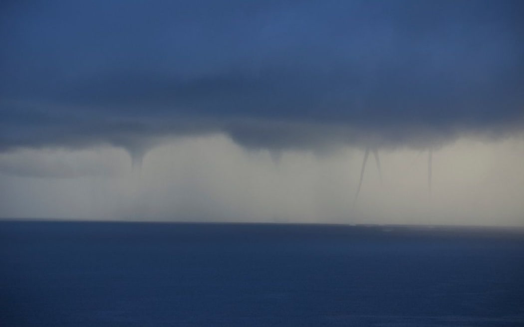 Waterspouts formed near Waiheke Island before moving into the Firth of Thames.