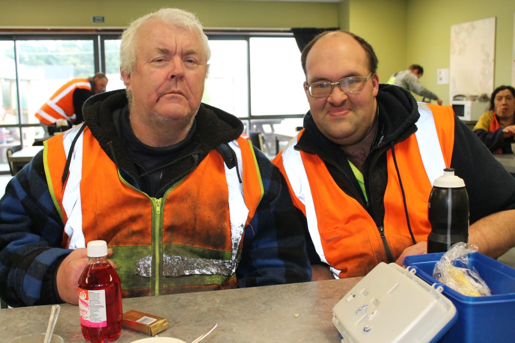 A photo of recycling team members, Ian Thompson and Andrew Doak taking a break in the canteen