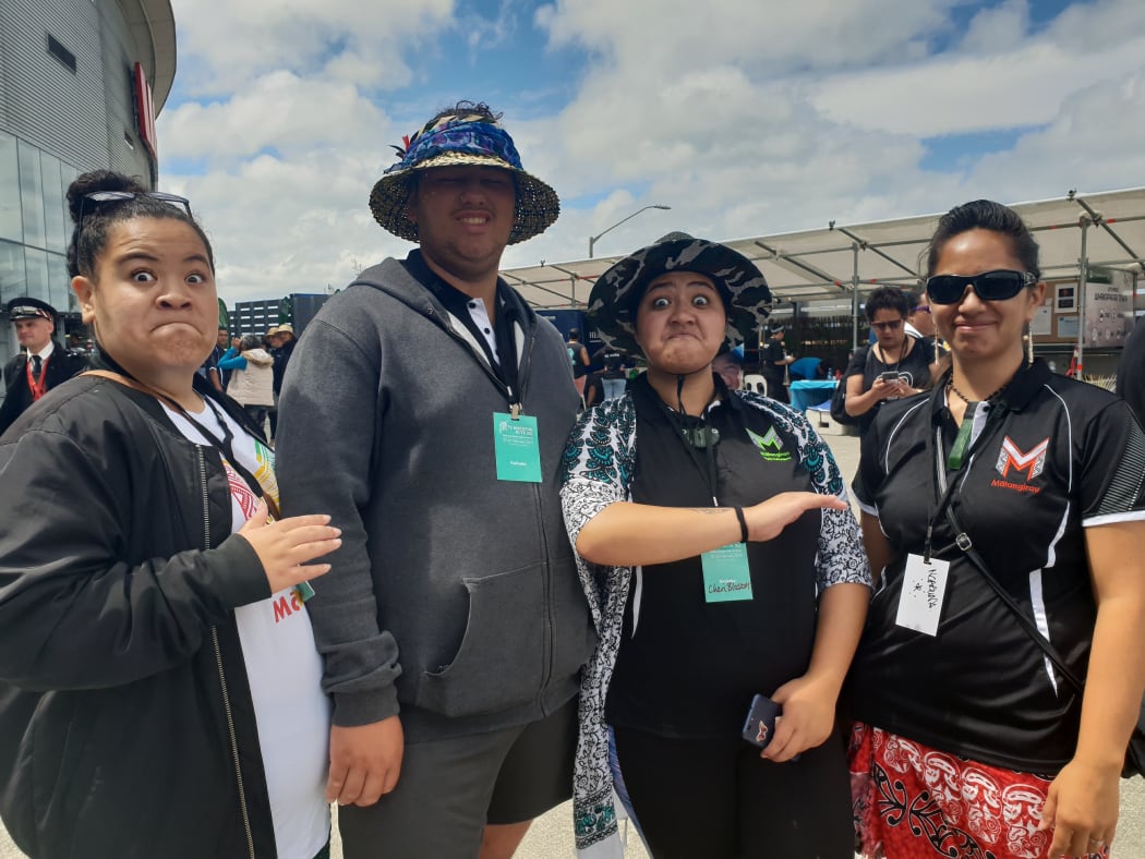 Kaihaka flash a pūkana at the festival.