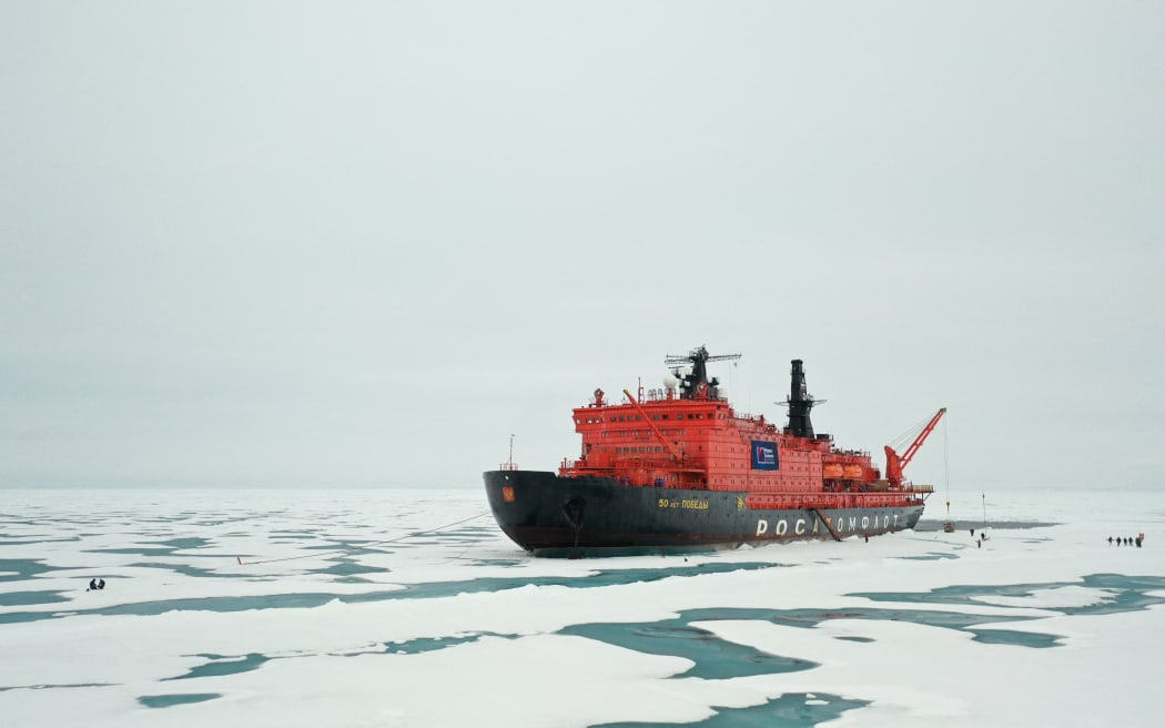The Russian "50 Years of Victory" nuclear-powered icebreaker is seen at the North Pole on August 18, 2021. (Photo by Ekaterina ANISIMOVA / AFP)