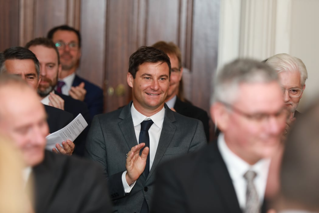 Clarke Gayford applauding.