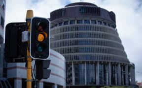 Orange Traffic Light in front of Parliament