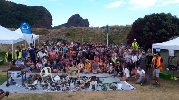 The Sustainable Coastline group and volunteers who helped with cleaning up West Auckland beaches and some of what they found.