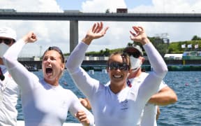 Winners New Zealand's Lisa Carrington (R) and New Zealand's Caitlin Regal celebrates after in the women's kayak double 500m final during the Tokyo 2020 Olympic Games at Sea Forest Waterway in Tokyo on August 3, 2021.