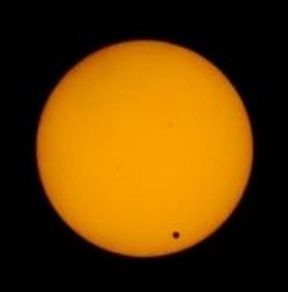 Venus is seen moving across the face of the sun, on June 6, 2012.