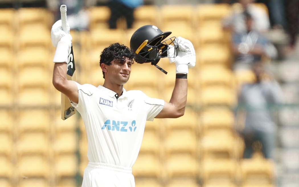 Rachin Ravindra of New Zealand celebrate his century during day 3 of the1st Test Match between India and New Zealand held at the M.Chinnaswamy Stadium, Bengaluru.

Photo by Arjun Singh / Sportzpics for BCCI